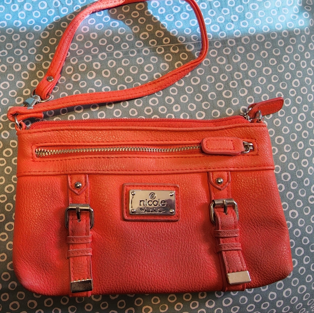 Peach Nicole Wristlet with card slots.